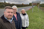 Cllr Liam Walker with South Leigh Parish Council chair Nicky Brooks and Vice Chair Lysette Nicholls by the A40 Barnard Gate junction. 